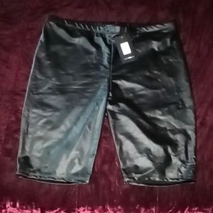 Size 1X Fashion Nova, black faux leather biker shorts. Brand New.